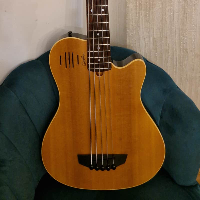 2000’s Godin A5 fretted natural