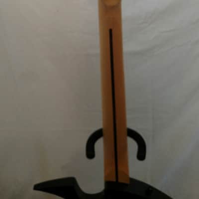 Trinity Bat-el'-ax image 14