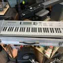 Korg Triton Le music workstation with Roadcase
