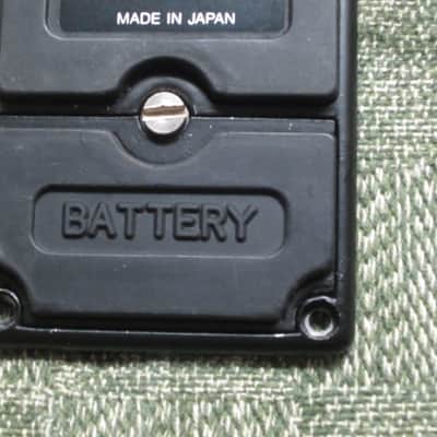 used Stinger Effects Pedal BOTTOM PLATE and BATTERY COVER & Screw (NO pedal included / NO other items included) late 1980s - Metal Plate with Black Finish, Black Rubber Padding, Black with Silver Graphic Bottom Label (made by the Martin Guitar Co) image 8