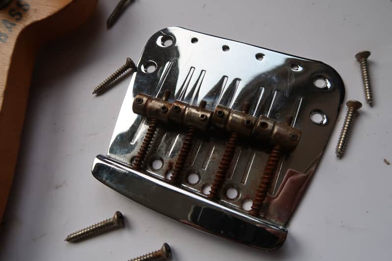 Fender Mustang Bass  Bridge 60's 70's Plate , saddles and screws USA RI image 1