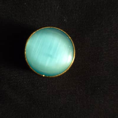 Gold and blue tone knob with screw image 1