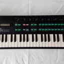 Yamaha DX100 Programmable Algorithm Synthesizer 1985 - Black