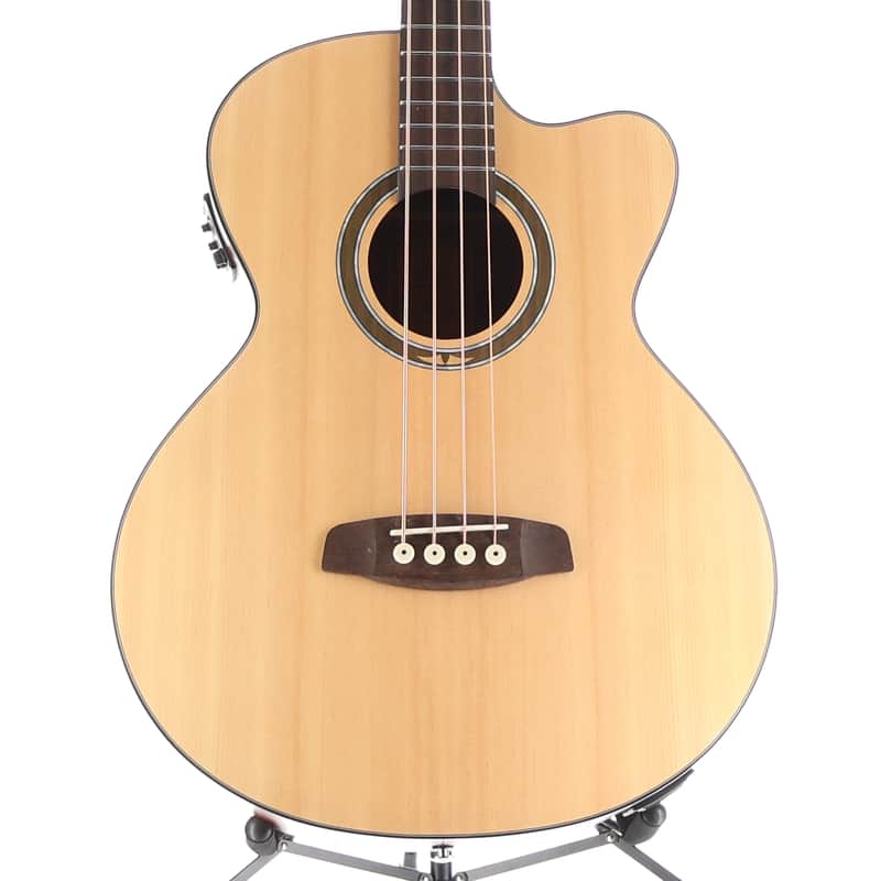 A light wood acoustic guitar, viewed from the front, on a stand.