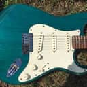 Fender American Deluxe Stratocaster in Transparent Teal 1998 Electric Guitar USED