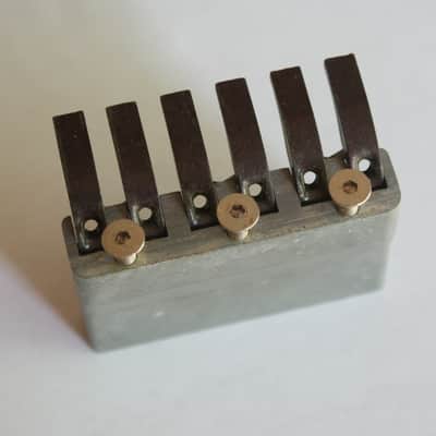Fender  System One Bridge Block, Tuning Tongues, and Spring 1984-87 Zinc/Blck. image 1