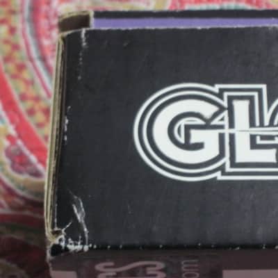 lightly handled Electro-Harmonix EMPTY CARDBOARD BOX and original Owner's Manual ONLY for OD Glove Overdrive (NO pedal, NO warranty / registration paperwork) 2010s - BOX: cardboard - OUTER AREAS: gray // GRAPHIC: black & white, also purple & white image 11