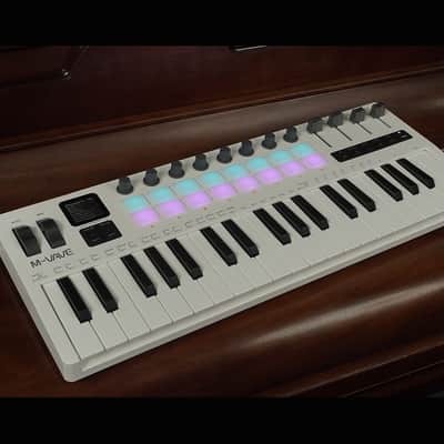 Keyboard 37 Key 3.5mm MIDI 16 RGB Drum Padswith Sound Source Supports Wireless Connection To Multiple Systems image 1