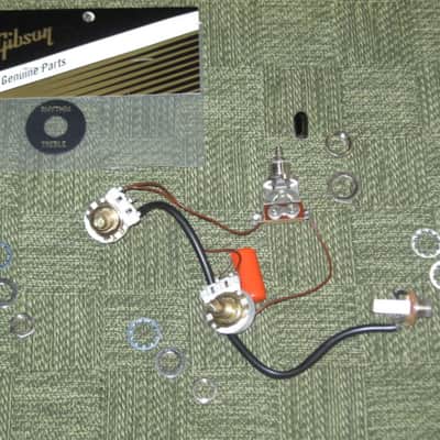 used 1997 Gibson control harness: 1 vol pot & 1 tone pot short shaft +nut/washer,wires,wire insualtion,capacitor,jack+nut/washer,switch +switch tip,nut +comes w/ new switch washer (NO other parts included) from The Hawk guitar (guitar NOT included) image 1