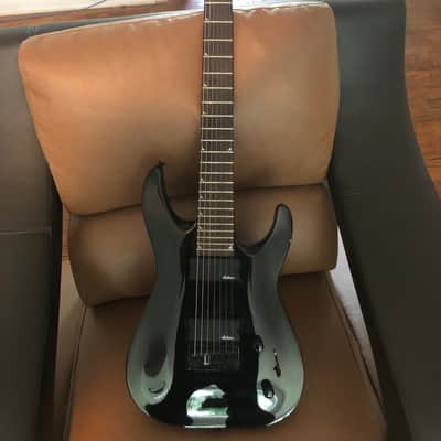 Jackson 7 string w/ EMG pickups + gig bag and cable. 2016/gloss black image 1