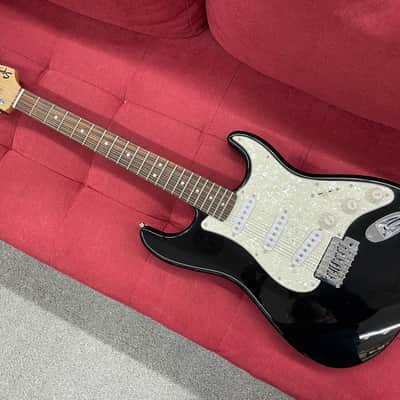 Squier Strat - Black W/ Pearloid Pickguard image 1