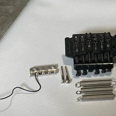 1990's Jackson King V & Dinky Guitars JT-580 Takeuchi Black Licensed Floyd Rose Tremolo Guitar Bridge image 1