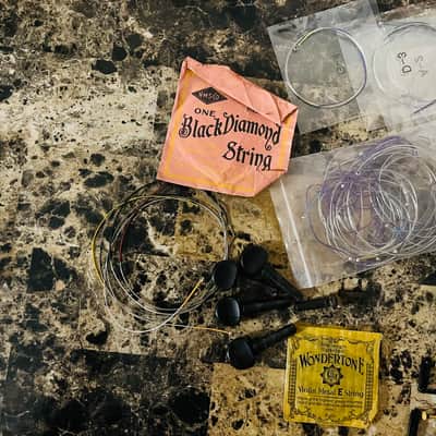 Violin fittings; bridges chin-rest, various brands of strings new and old. Project for luthier, pegs and other fittings. Sold as is. image 4
