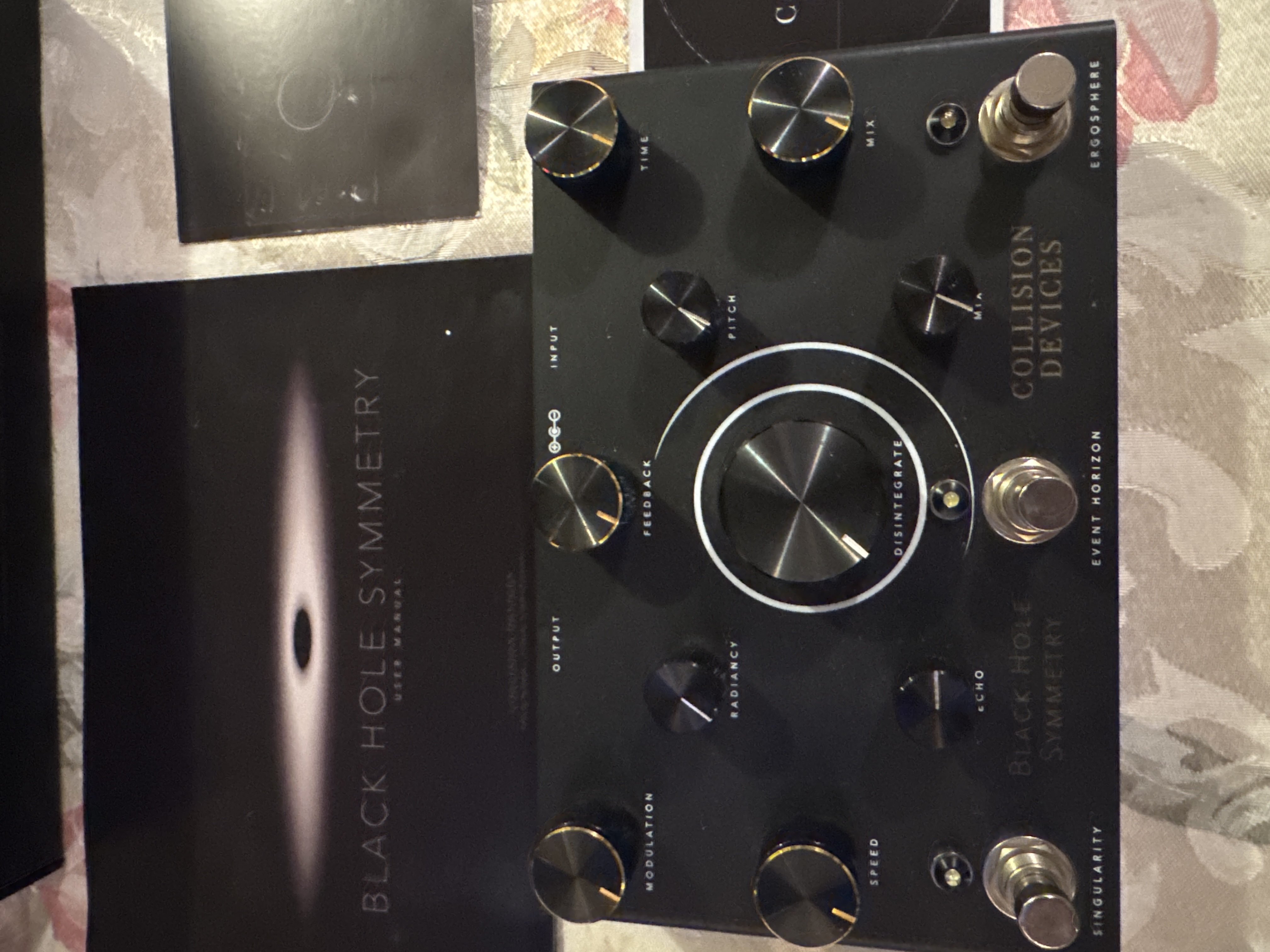 Collision Devices Black Hole Symmetry