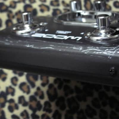 lightly used (most areas / sides are very clean- the FRONT side has several visible scratches) ZOOM G2NU GUITAR EFFECTS & USB AUDIO I/F PEDAL (comes with batteries) image 6