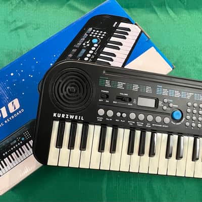 Kurzweil KP10 keyboard, 32 mini keys, 128 tones, recording and play