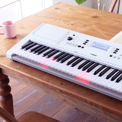 Yamaha EZ-300 61-Key Portable Keyboard with Lighted Keys