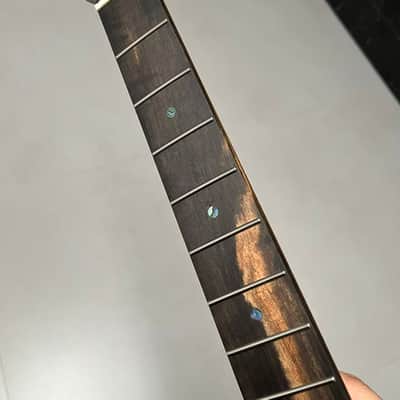 2.9mm frets Striped Ebony Fretboard 22frets 5a Roasted flame Maple guitar neck Radius 12inch Round stainless steel 22 frets Roasted flame Maple guitar neck Striped Ebony fingerboard 25.5inch hole 10mm Radius: 12 inches. image 2