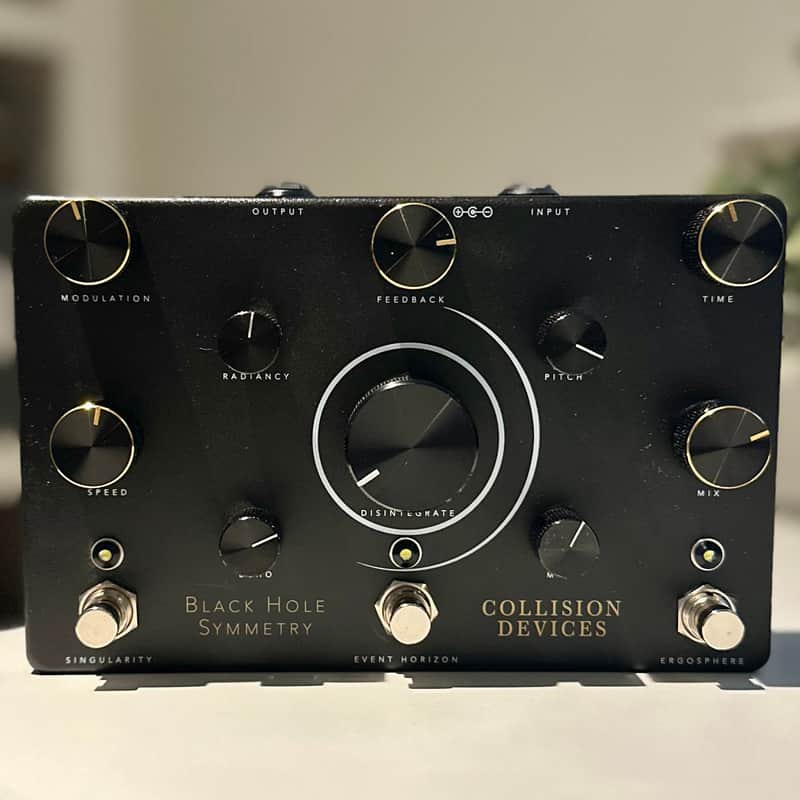 Collision Devices Black Hole Symmetry