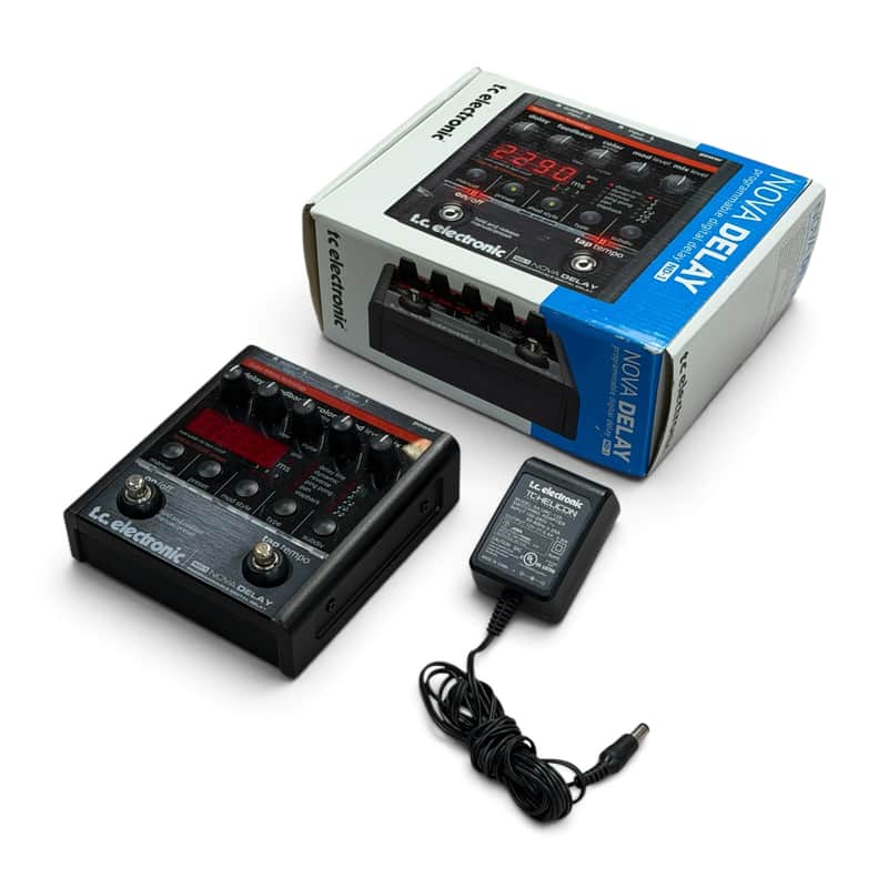 Black digital delay pedal with knobs and LED display.