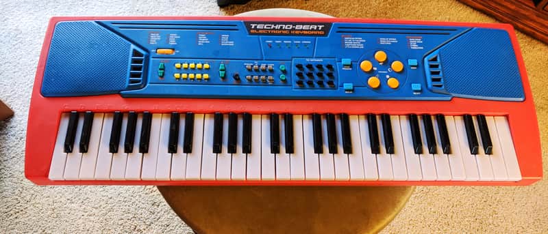 Techno-Beat Electronic Keyboard Concert Play/Demo Manley 2005 Red 54 Key, Battery Powered image 1