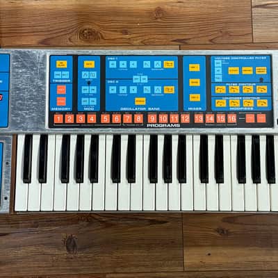 Moog Source Monophonic Analog Synthesizer with Patch Memory 1981 - 1985 - Blue
