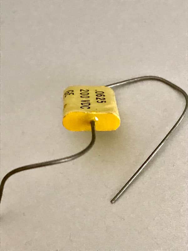 GE .0625 uF 200 VDC Mylar Capacitor Phone Book style 1970s - Yellow, measures .068 uF image 1