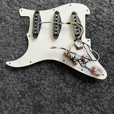 Complete pickguard from a 1996 Fender Standard Stratocaster MIM image 2