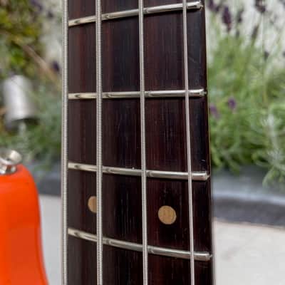 1964 Fender Precision Bass in Fiesta Red. image 21