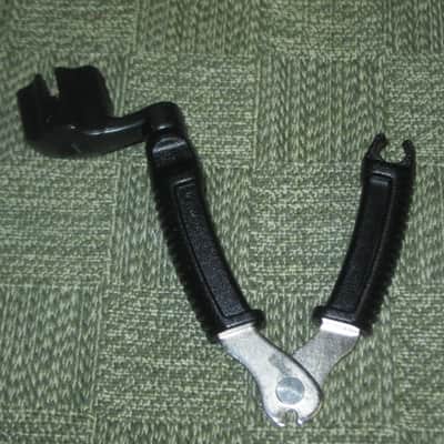 new (no package) very near A+ D'Addario Planet Waves PRO-WINDER Black String Winder & Cutter & Bridge Pin Puller DP0002 for guitar, mandolin, ukulele & banjos (black hard plastic with hardened steel wire cutters) just has few minor natural imperfections image 24