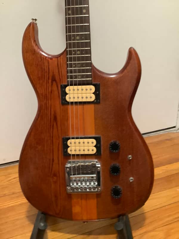 Cort Neck-Thru Early 80s Natural Wood Grain Electric Guitar image 1