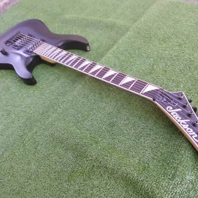 Jackson JS30 Super Strat Archtop 24 Jumbo Frets Sharktooth Inlay Dual Humbucker Tremolo Midel Vintage Style Big Block Strandard Trem Factory Original Satin Black image 1