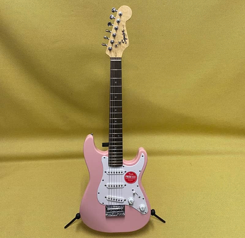 037-0121-556 Squier by Fender Mini Stratocaster Electric Guitar Shell Pink image 1