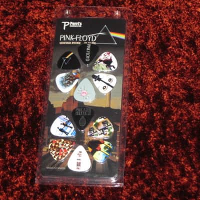 new in package (old stock) A+ Perri's Leather Ltd. / Perri's 12 Pack Of Pink Floyd Guitar Picks - Med Gauge - Celluloid Plastic, 351 shape - but slightly curved (LP12-PF1) LP12PF1 image 1