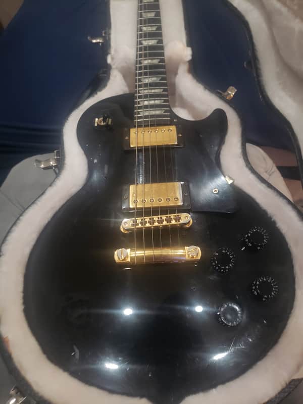 1993 Gibson Les Paul Studio Black Electric Guitar Ebony Fretboard Maple Neck Tune-O-Matic Bridge Gold Hardware Pearl Trapezoid Inlays Gibson Hardshell Case image 1