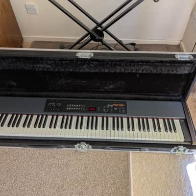 Roland RD-150 88-Key Digital Stage Piano with flight case and stand
