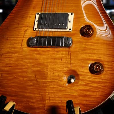 with a Flame Maple top, Mahogany neck with a Wide-Fat profile, East Indian Rosewood fretboard with moon inlays, Straight stoptail bridge, McCarty treble and bass pickups, finished in McCarty Sunburst, with nickel hardware. image 3