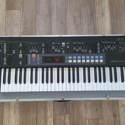 Akai AX60 1980s  Vintage analog polyphonic synthesizer with flight case