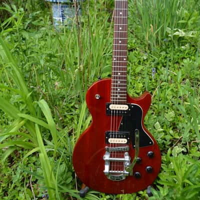 2019 Gibson Les Paul Special Limited Edition in a Heritage Red Cherry finish w/Upgrades such as a Bigsby, Dunlop Black Straploks, Kluson Locking Tuners, New Stringjoy Strings and Newer Brown Gibson HSC image 2