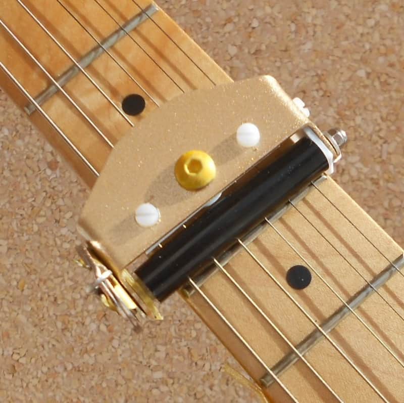 6th Finger Rolling Capo - Gold.  Fastest in the world ! image 1