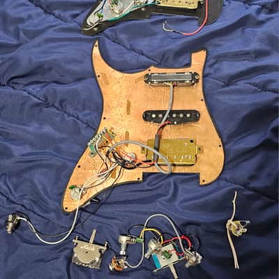 Loaded Pickguards 2pcs.: Squier Standard Double Fat Strat Pickguard (w/ stock HH pickups) + Tagima JA-3 pickguard (HSH pickups) image 1