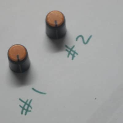 two used genuine Boss DF-2 KNOB, fits split shaft shaft (stem) mid 1980s/early 1990s - TOP: orange with black marker // SIDES: black // hard plastic (NO: pedal/other items) TOP side: some short scratches & few nicks / BLACK areas: few scratches image 2