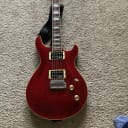 Cort  M600T Trans Red with Rockfield Pickups