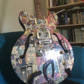 Old Antoria Guitar covered in 80's Sliver Surfer Comics, no pickups, worn frets. PROJECT image 4