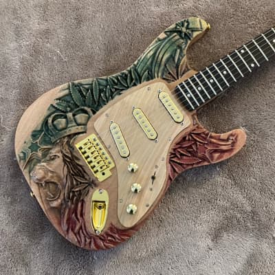 Natural Mystic (Rasta Lion) Carved Woodruff Brothers Guitar - Mahogany for sale