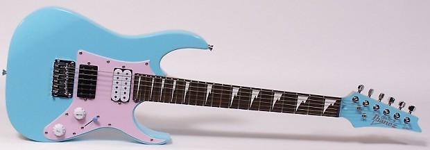 Pink and shop blue guitar