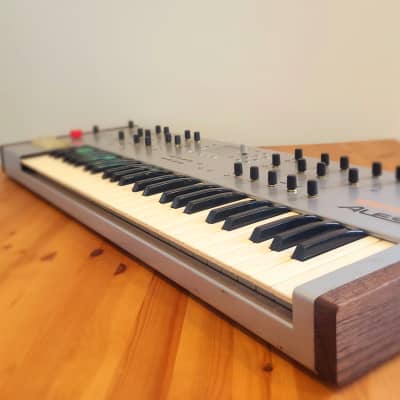 Alesis Ion 49-Key Analog Modeling Synthesizer with Custom Hardwood Side Cheeks, 2000s - Silver