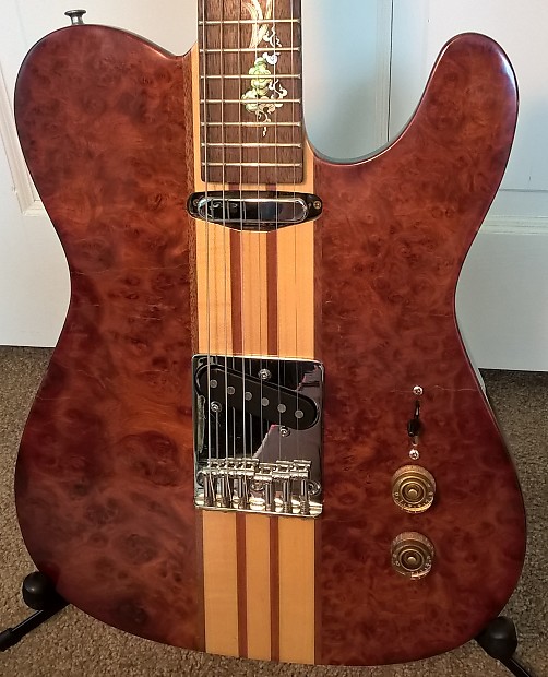 Neck through outlet telecaster