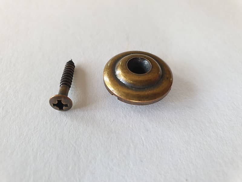 Bass string guide relic aged antique brass + screw | Reverb