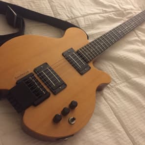 Headless shop archtop guitar